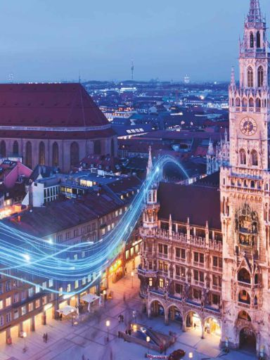Rathaus wird beleuchtet und von einer virtuellen Straße angesteuert